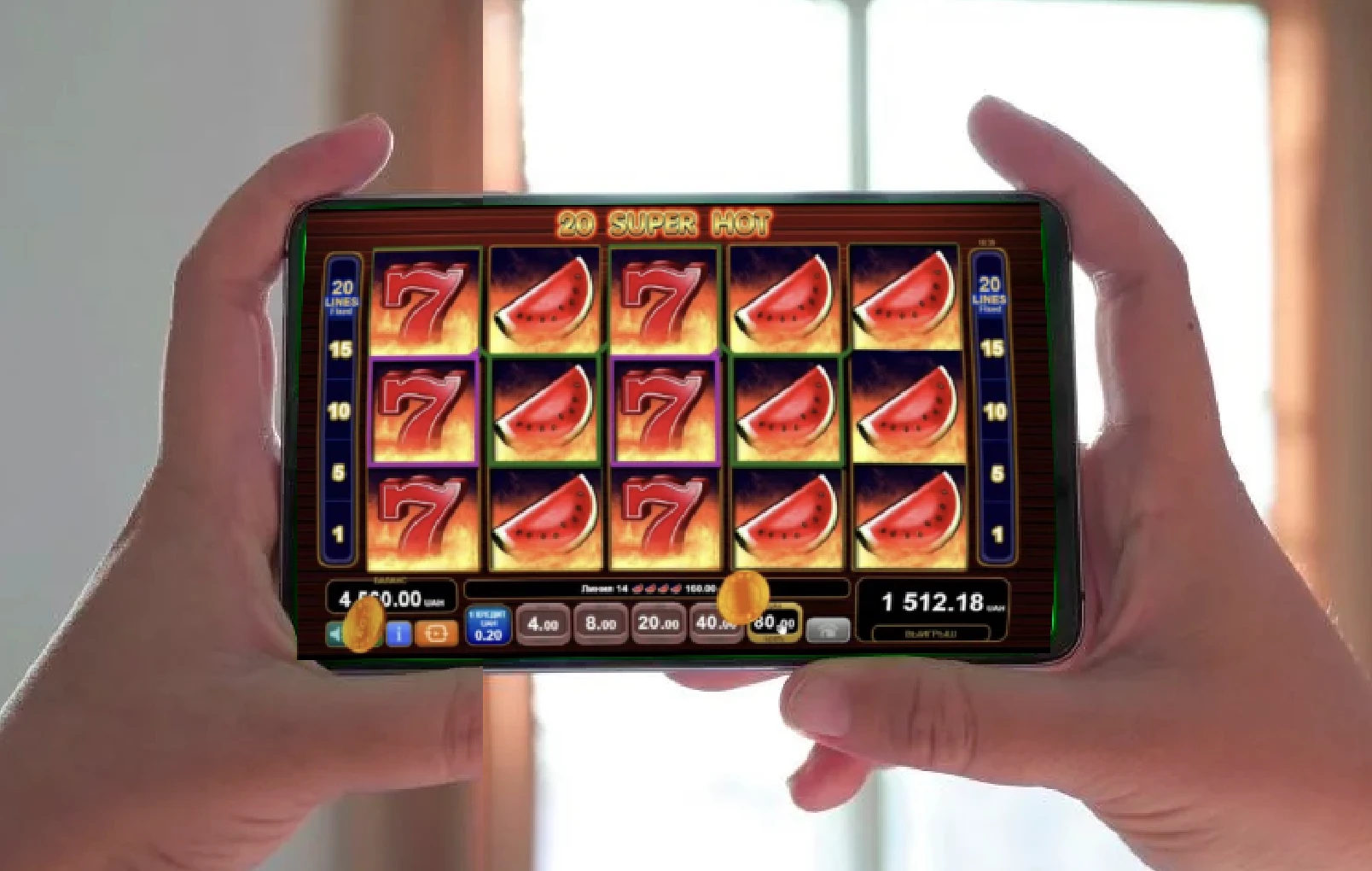 Игра на 20 Super Hot на мобилен телефон в ръце — 20 Super Hot Palms Bet